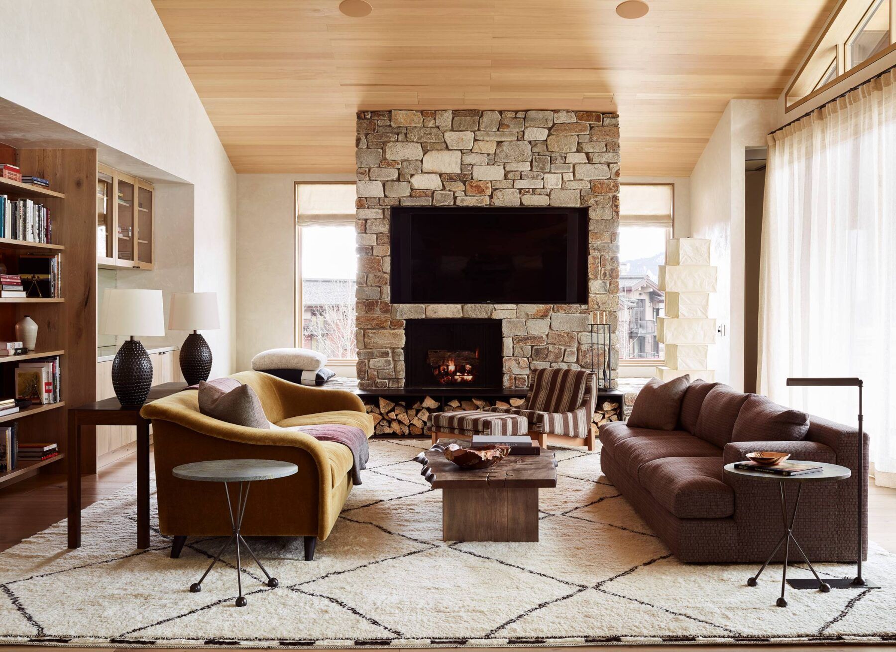 Caldera House suite living room with stone fireplace