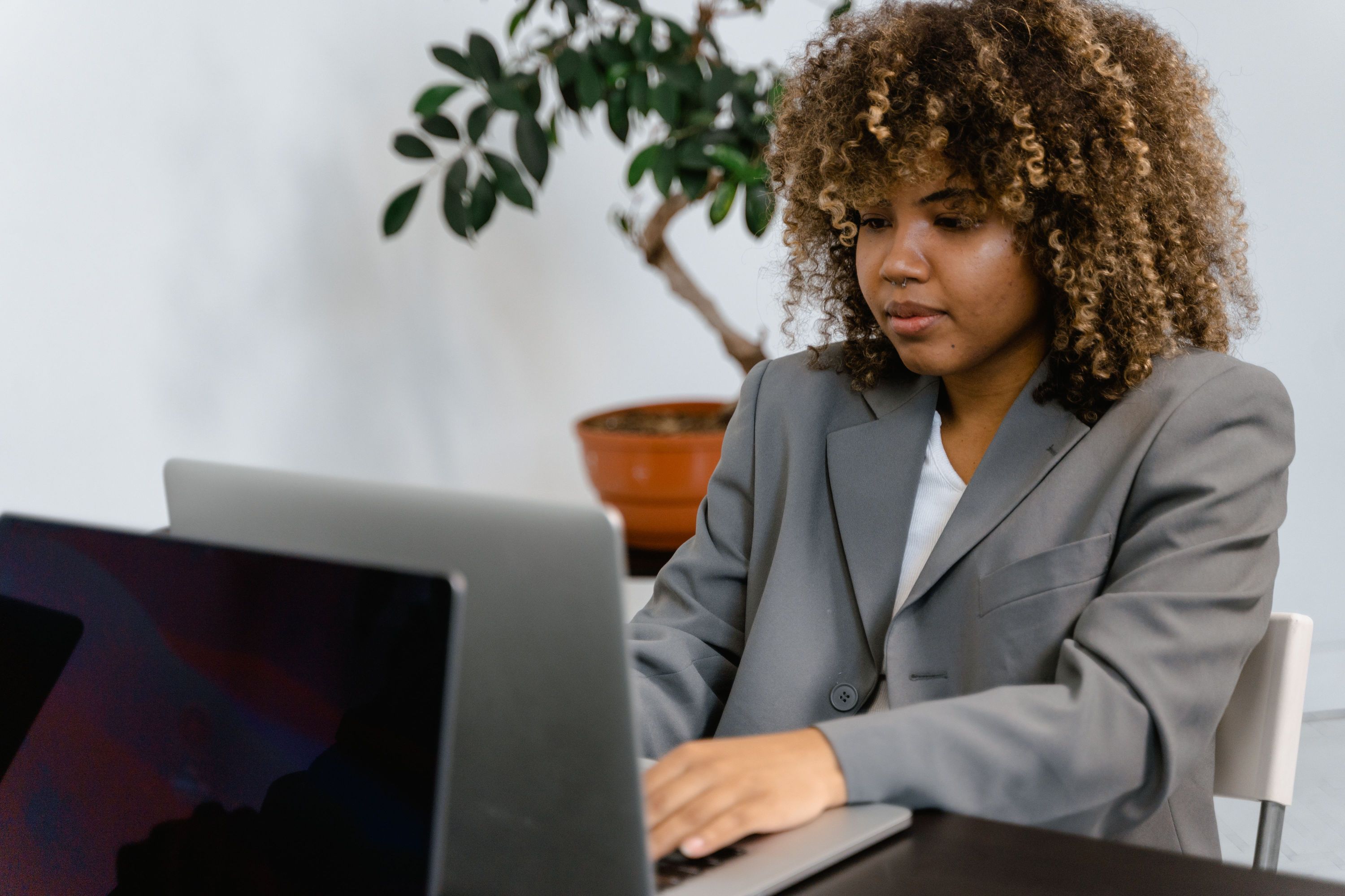 Marketing professional working on a laptop